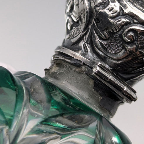 Antique British silver-lidded green cut glass portable perfume bottle